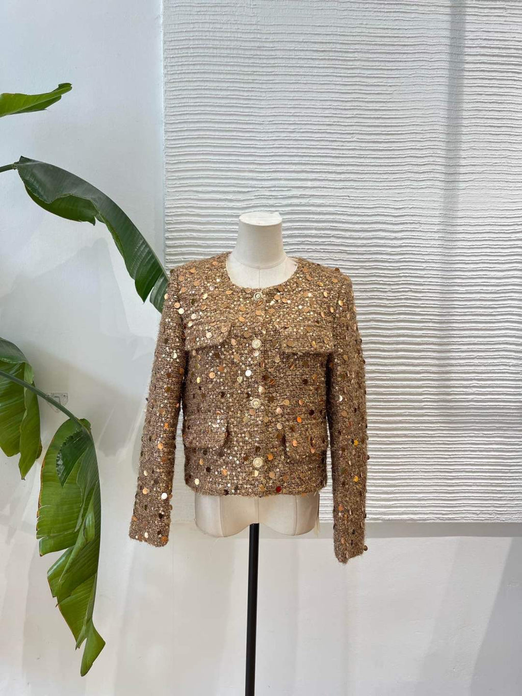 Chaqueta joya dorada