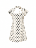 Cremefarbenes Kleid mit Tupfen