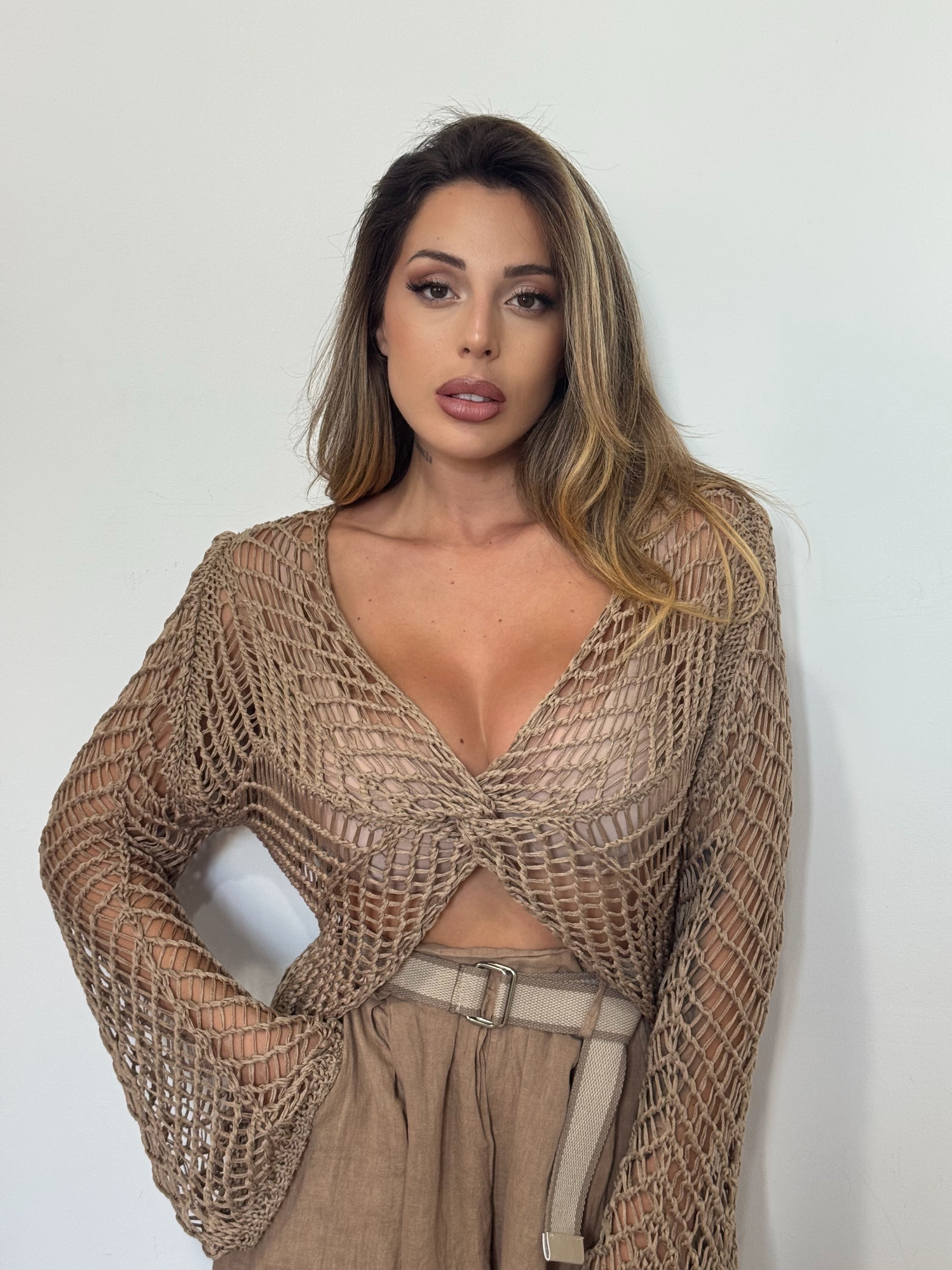 Top nudo perforados